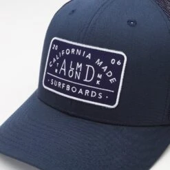 Navy Almond Trucker Hat -Surf Story Shop Almond trucker patch hat detail 1